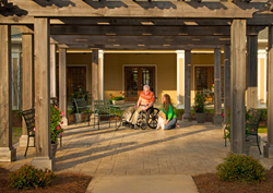Where We Are section photo: Picture of people seated enjoying the weather.